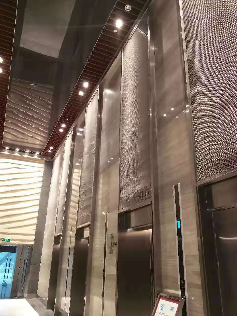 application of elevator cladding